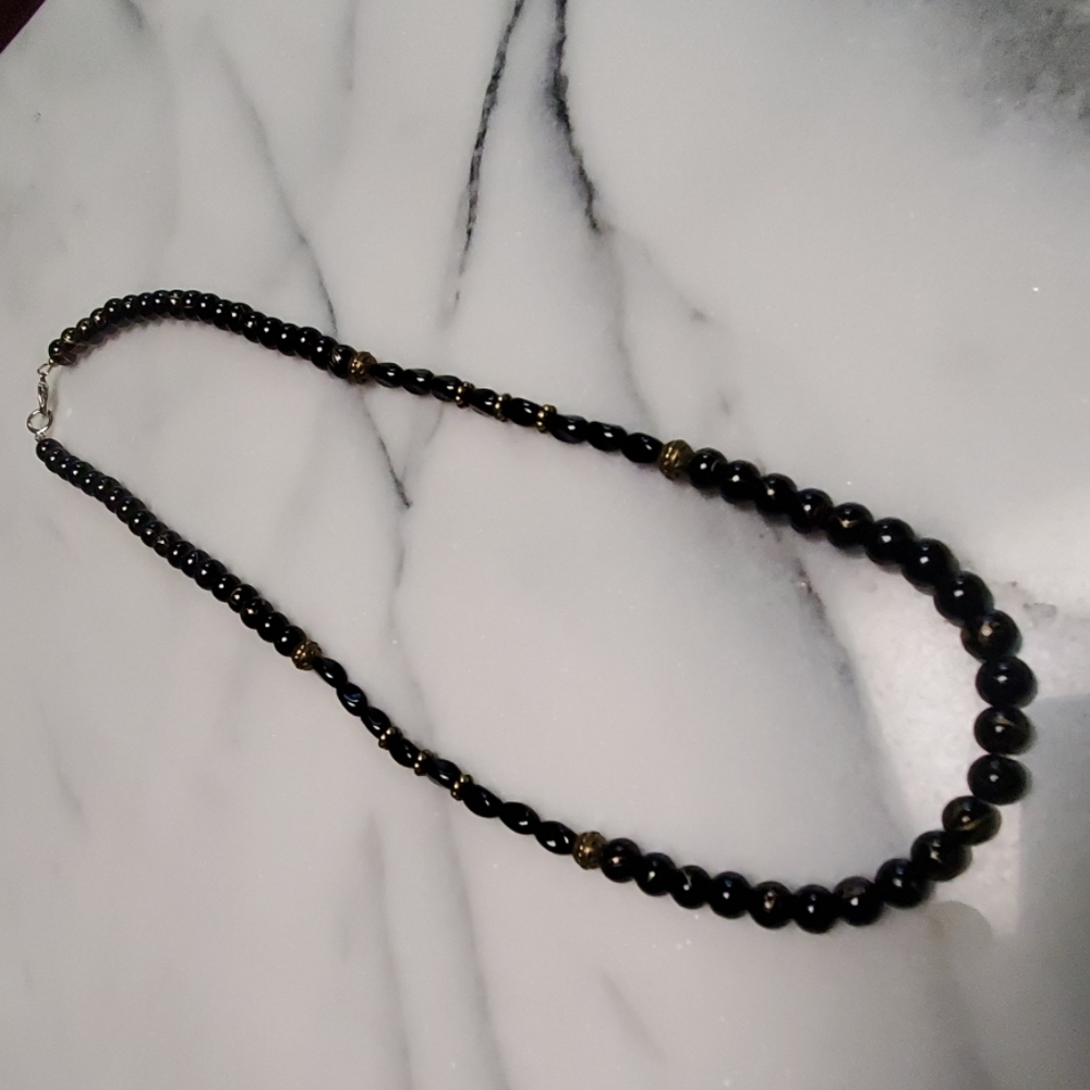 Necklace with bronze gold acents